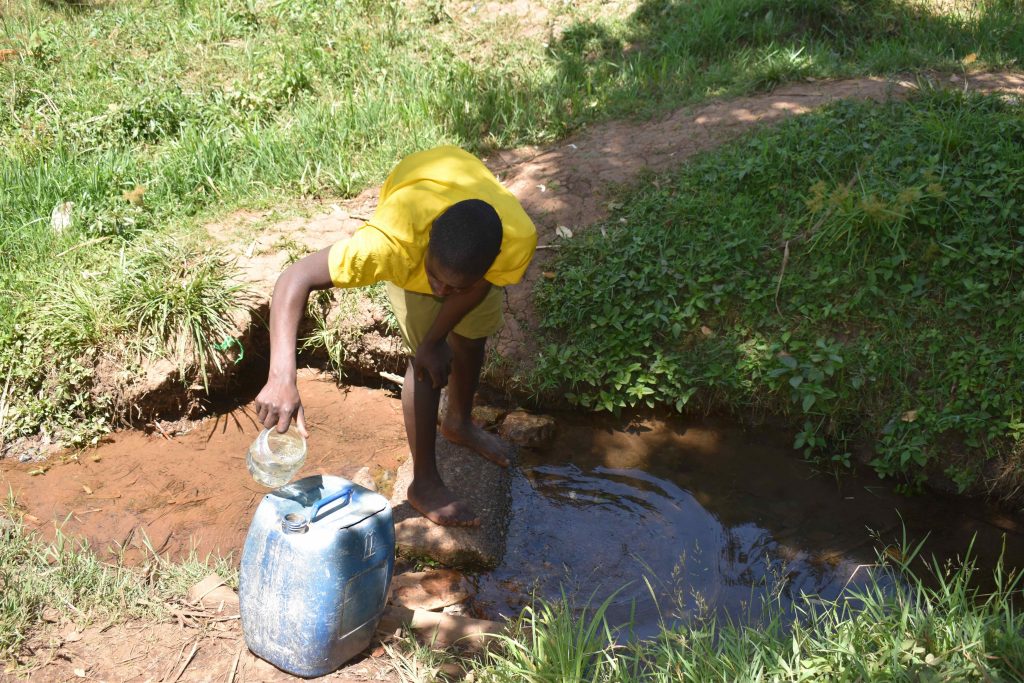 The Water Project : kenya22026-2-charles-at-spring-1-2
