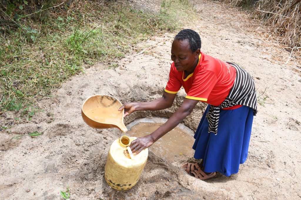The Water Project : kenya22510-22511-locals-fetching-water-5