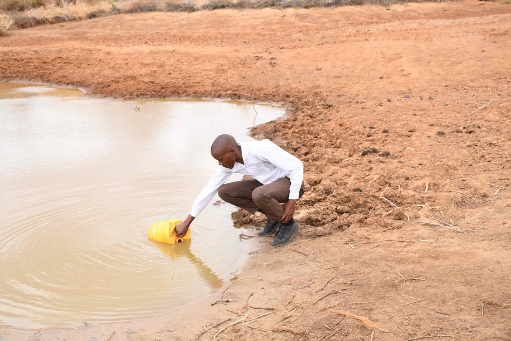 The Water Project : kenya22576-charles-at-water-point-2