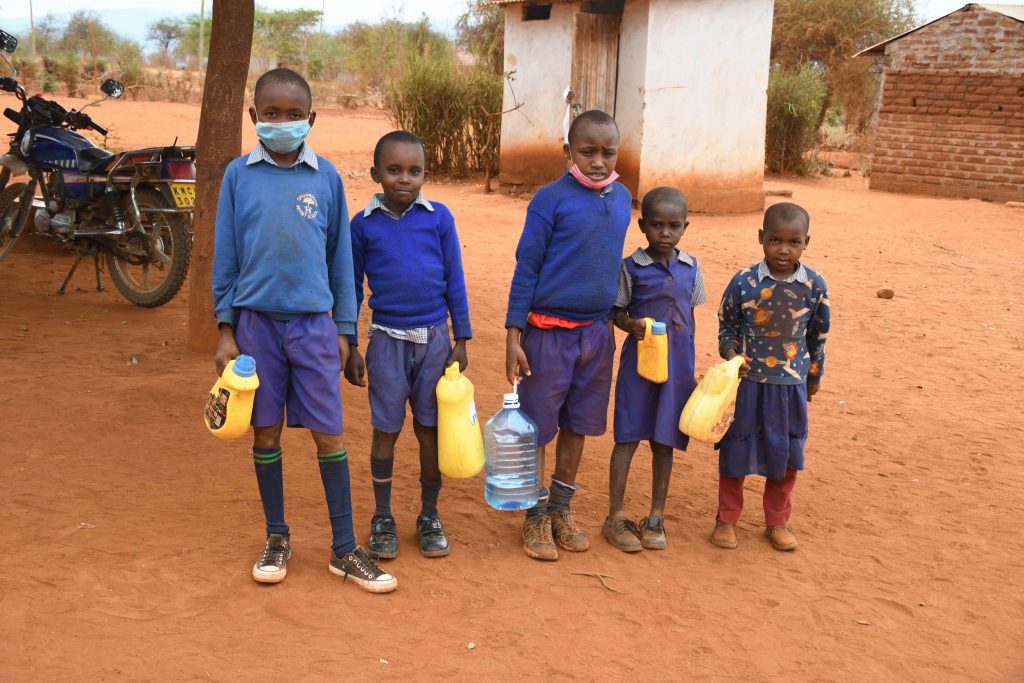 The Water Project : kenya22579-students-with-jerrycans-3