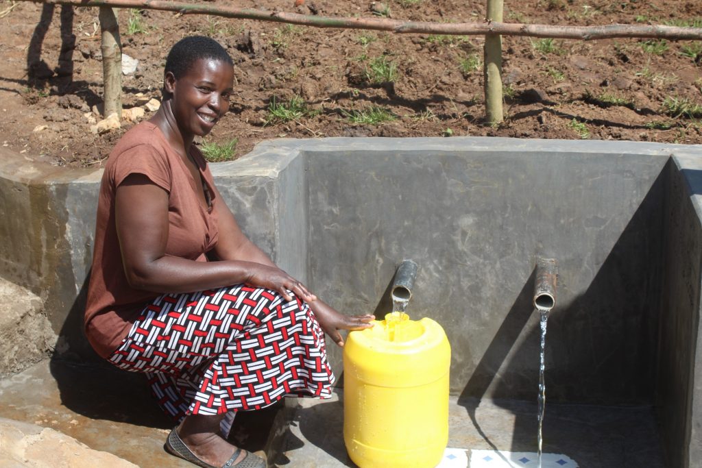 The Water Project : kenya21320-0-smiling-at-the-water-point-2