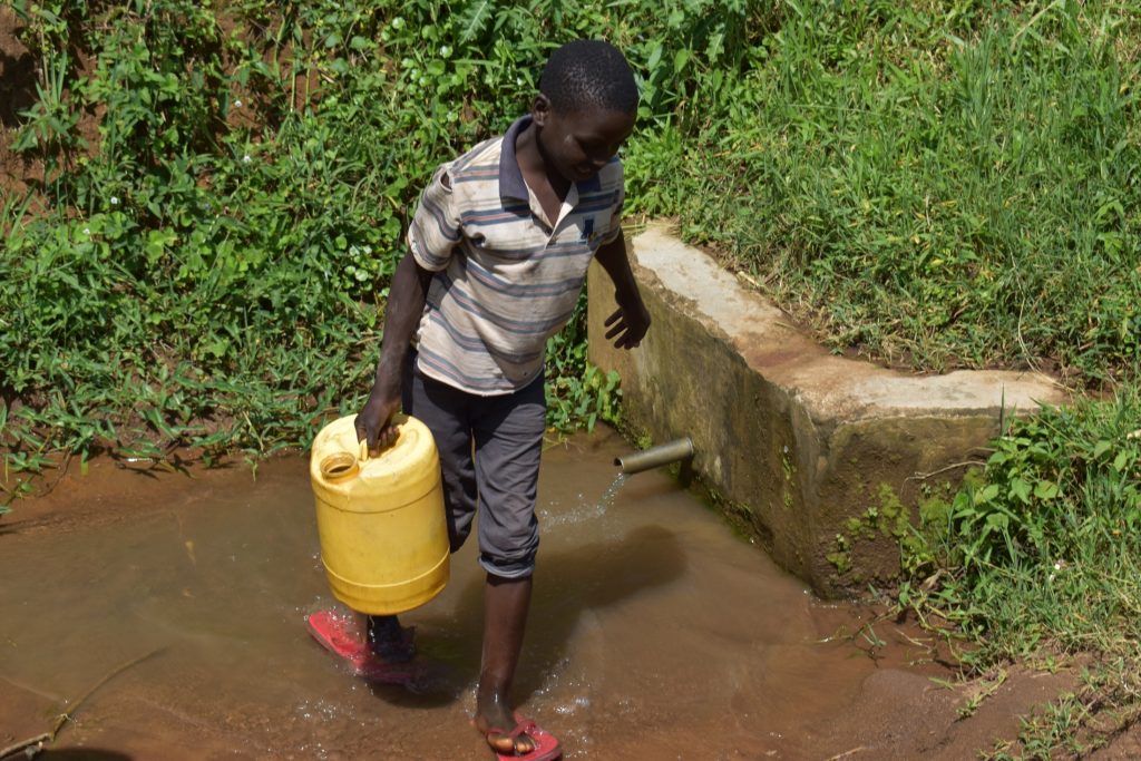 The Water Project : kenya22087-2-1-carrying-water-4