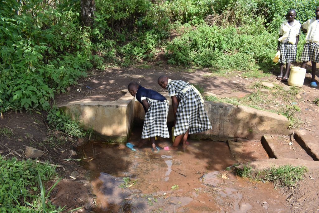 The Water Project : kenya22203-students-collecting-water-1