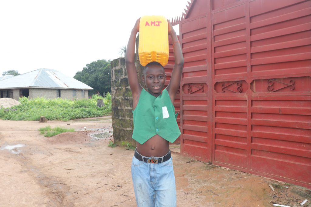 The Water Project : sierraleone22605-kid-carrying-water-3