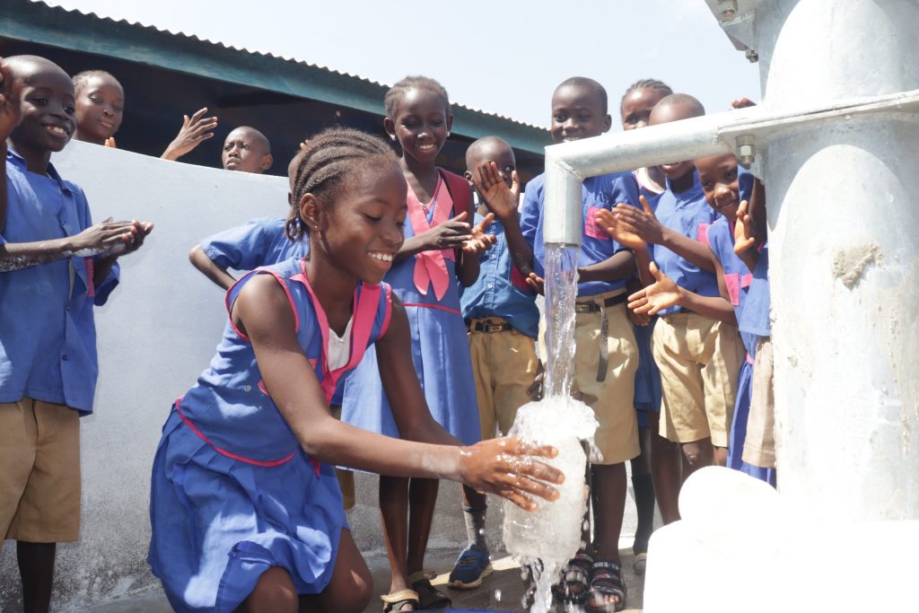 The Water Project : sierraleone21556-student-happy-for-clean-water2