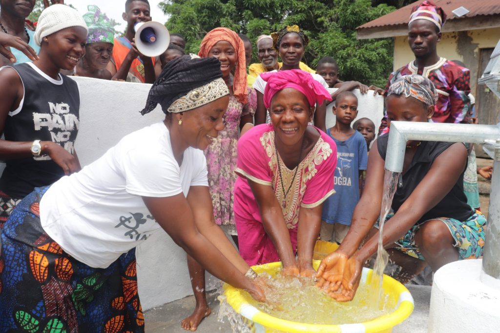 The Water Project : sierraleone21559-1-community-women-joyfully-splashing