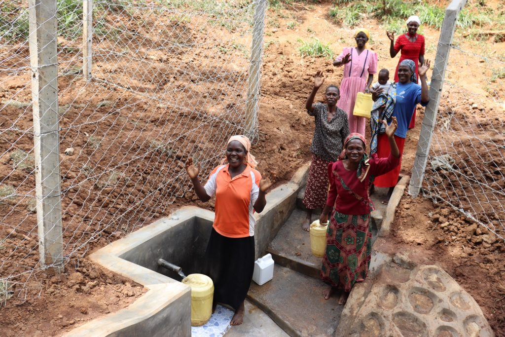 The Water Project : kenya22011-1-women-celebrating-water-10
