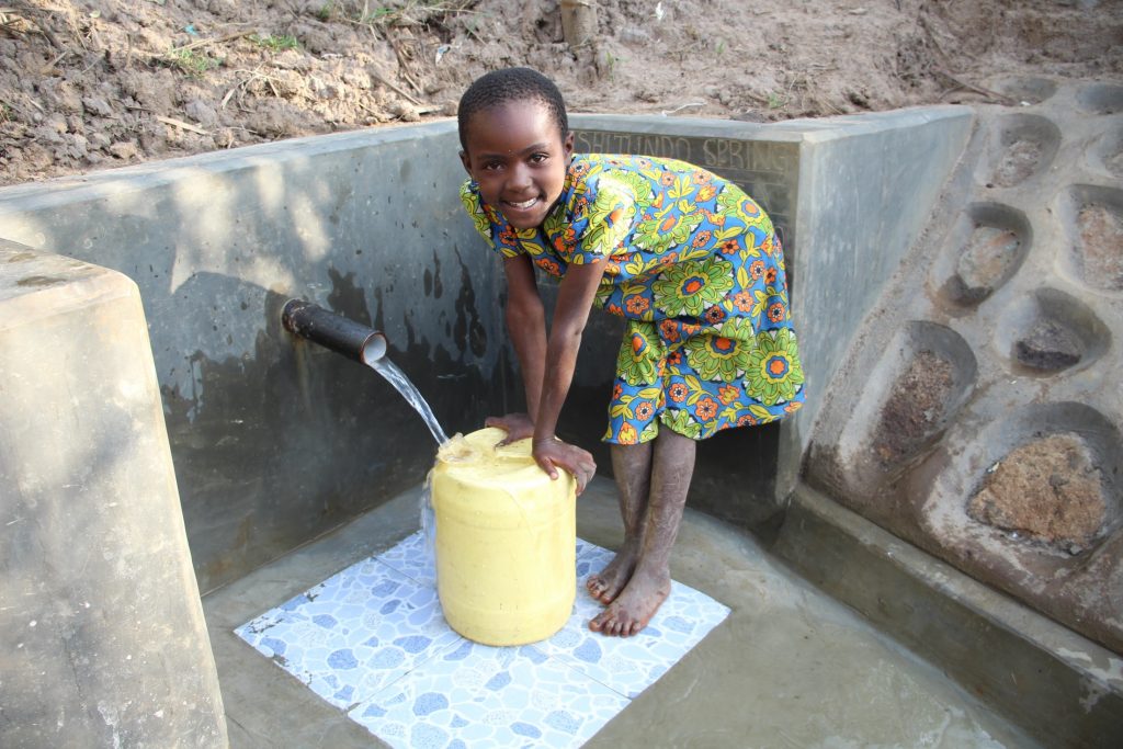 The Water Project : kenya22130-0-moreen-collects-water-3