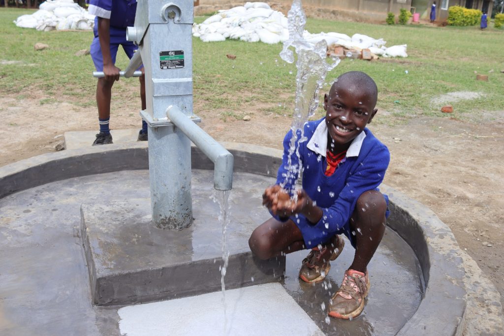 The Water Project : kenya22226-0-splashing-water-2