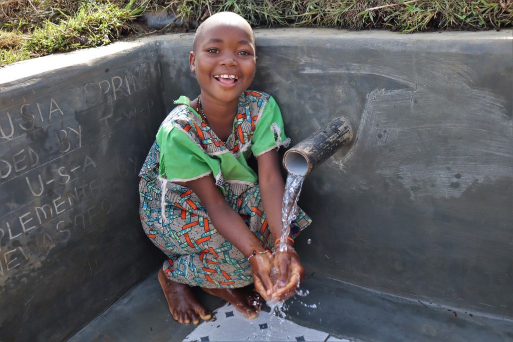 The Water Project : kenya22071-0-enjoying-water-2
