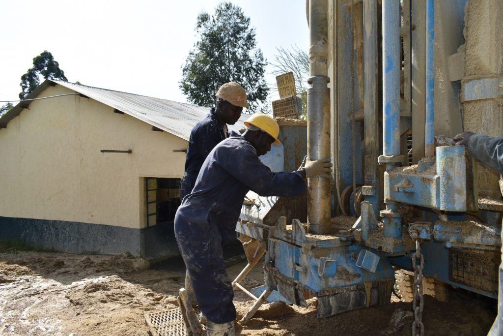 The Water Project : kenya22288-1-fixing-the-hammer-5