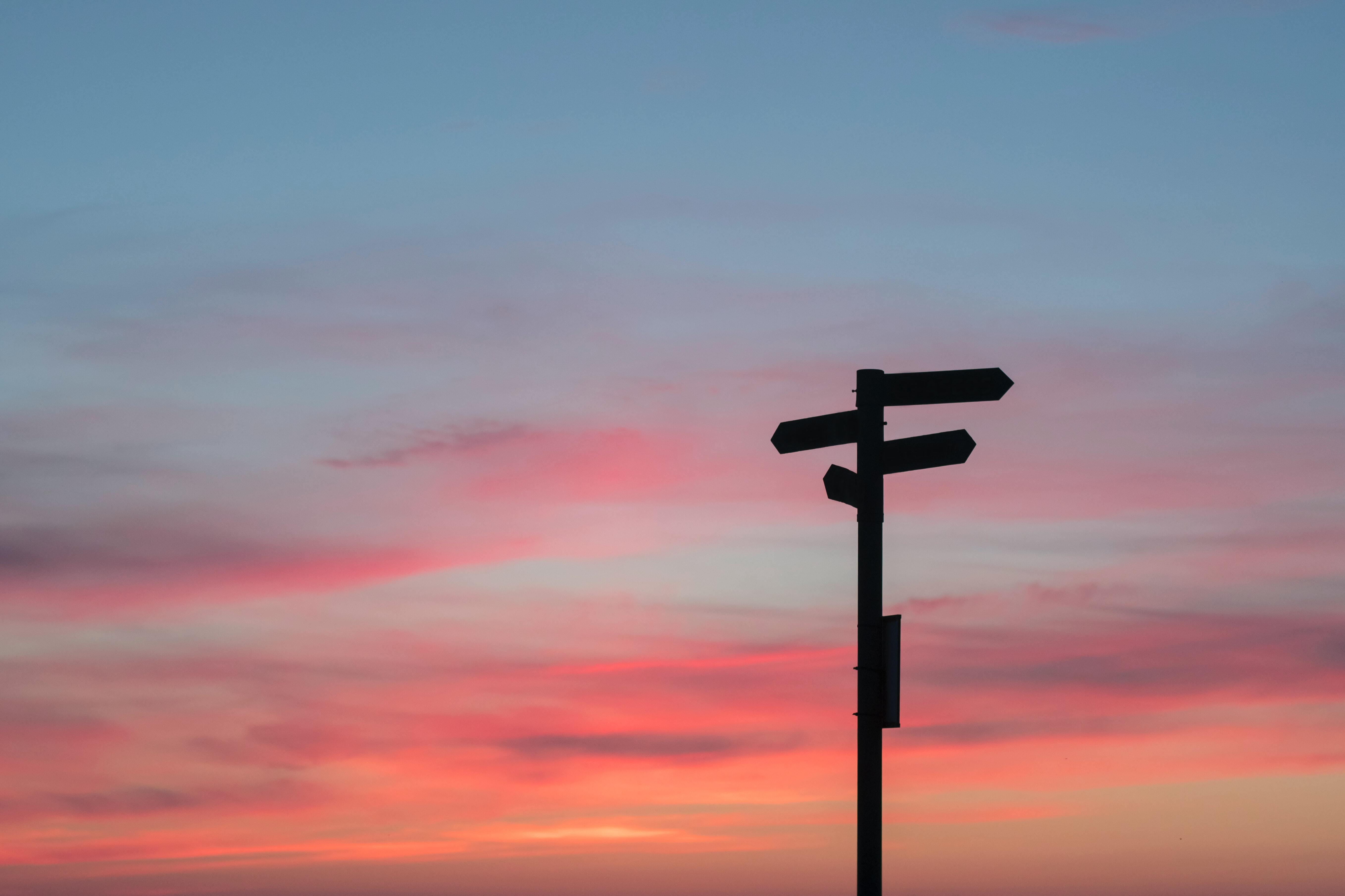 Crossroads sign at sunset