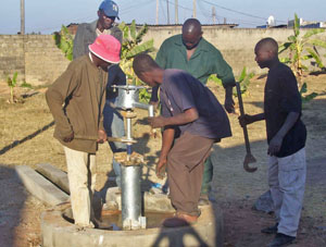 Nkwazi well getting new pump.
